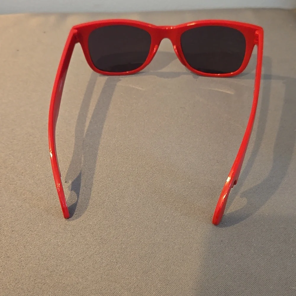 Red sunglasses unisex with bottle opener built in tailgate